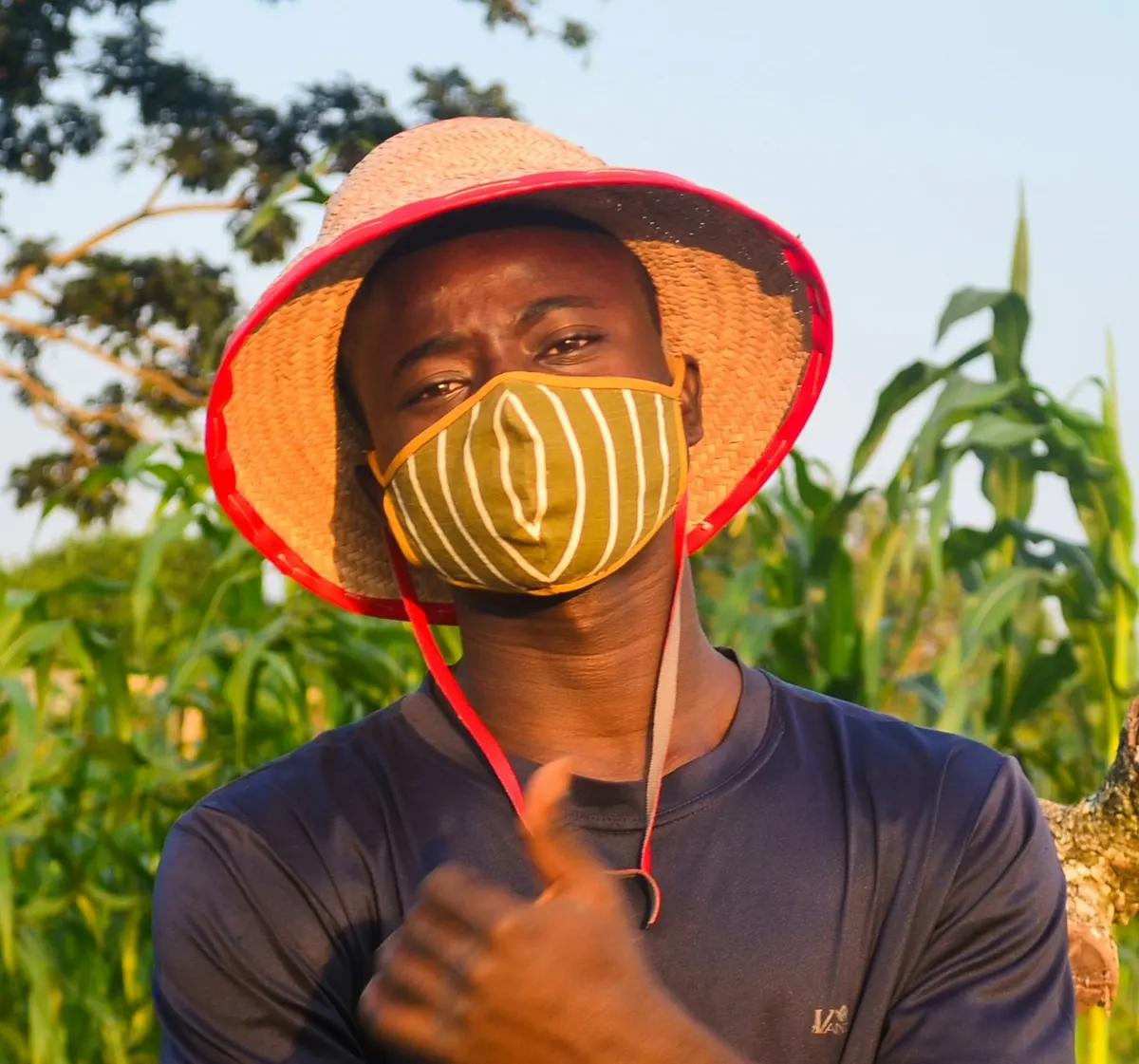 Farmer tending crops on a verified CheeFarms farm